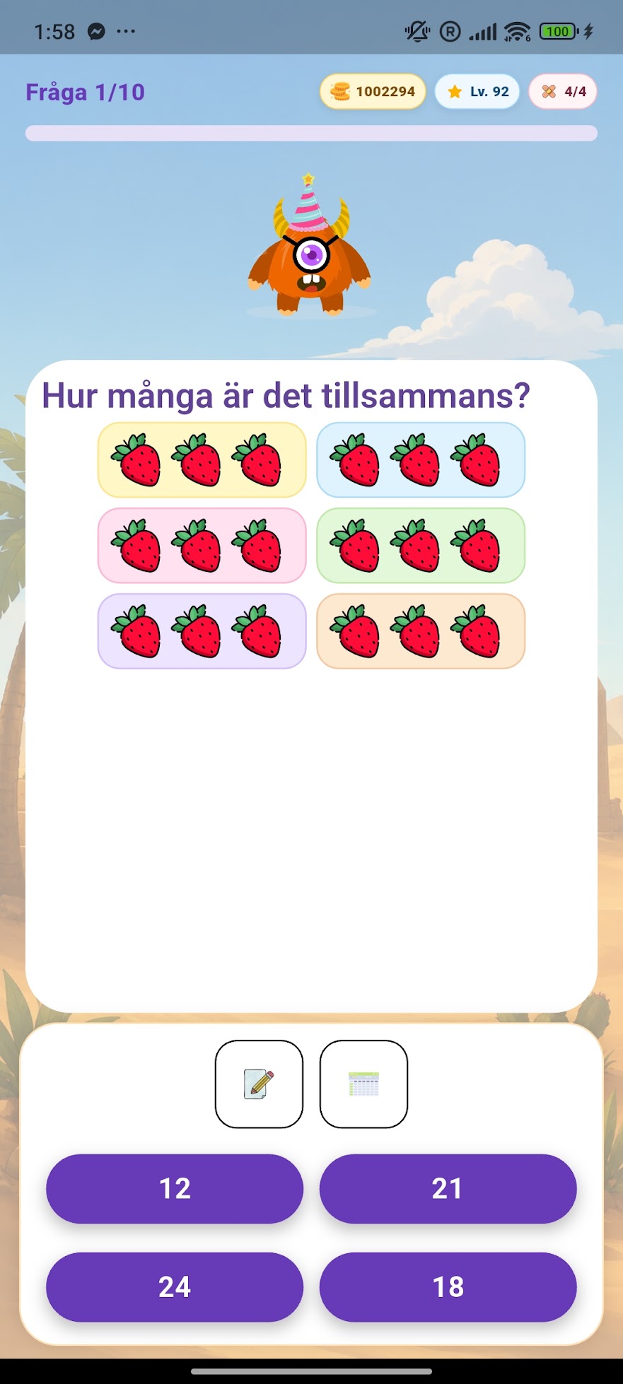 MathPop exercise where a child counts groups of strawberries